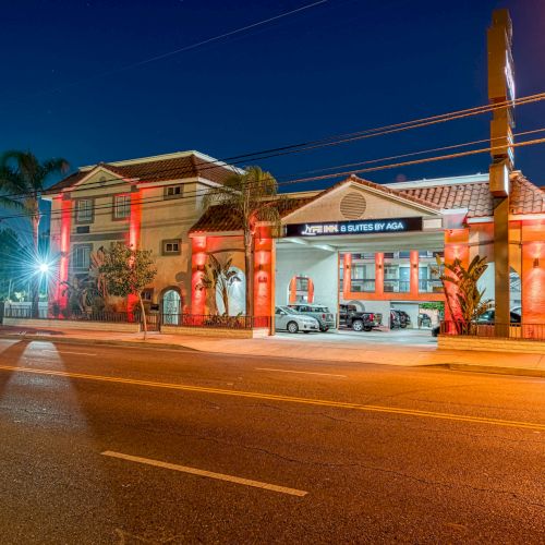 The image shows a brightly lit building with a sign reading 